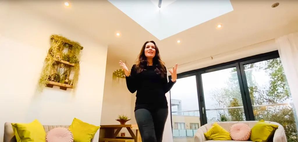 Georgina Burnett, "The Home Genie," in a living room under the Korniche Roof Lantern.