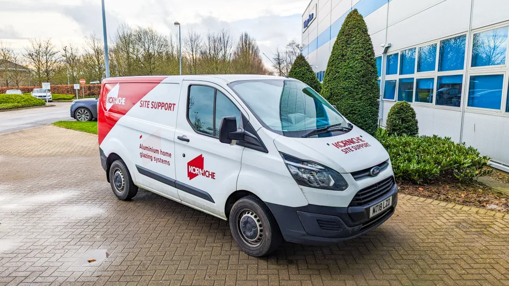 Made for Trade branded Korniche site support van with company logo on the side.