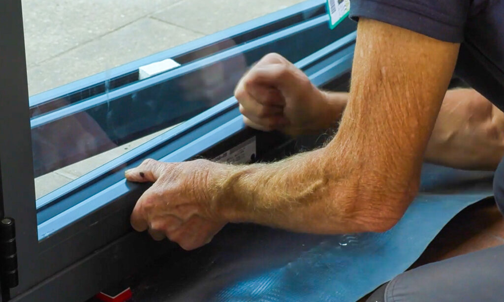 Roger Bisby easily installs the Korniche Speedbead clip-in bead with a simple push using his thumb and hand.