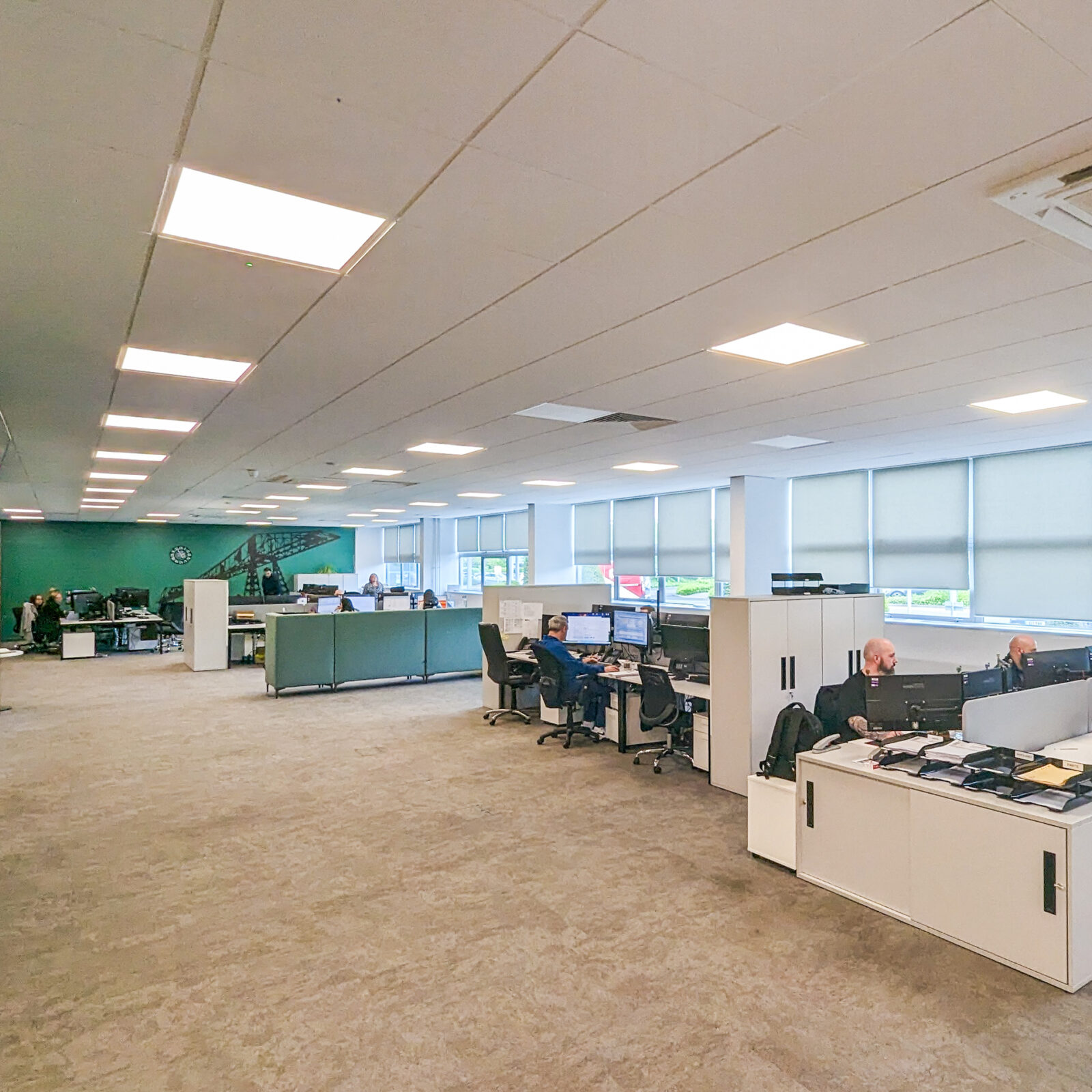 Korniche sales and quotes team collaborating in a bright and modern office environment. Join our team and build a rewarding career.