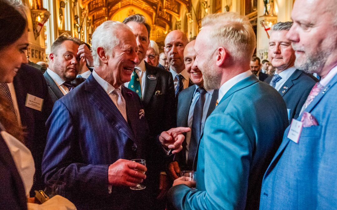 King Charles laughs and points with Made For Trade Managing Director Bradley Gaunt at the King's Award For Enterprise 2024 reception.