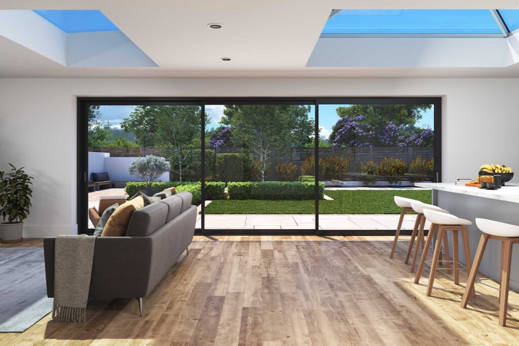 Cortizo 4700 Sliding Door with Korniche Technology, showcasing a modern interior with a Korniche Flat Glass Rooflight, Korniche Roof Lantern, and a view of a beautiful patio.