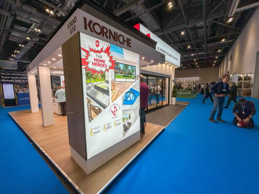 Graphic on the Korniche stand showcasing their product range and awards.